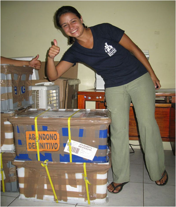 Finally the laboratory equipment arrived. PhD student Isabelle seems to enjoy the moment. Photo: Beate Hillmann, SLU.